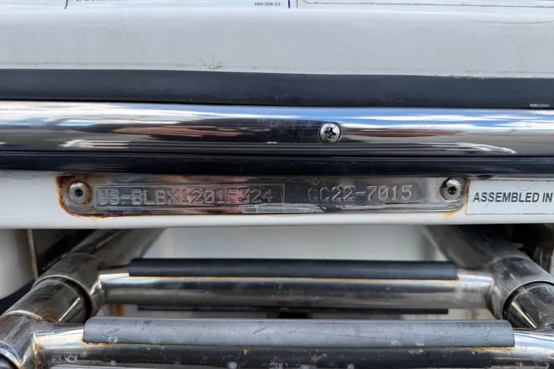 Slide: The Image of 2024 Bayliner Trophy T22CC boat identification plate with serial number. - 66