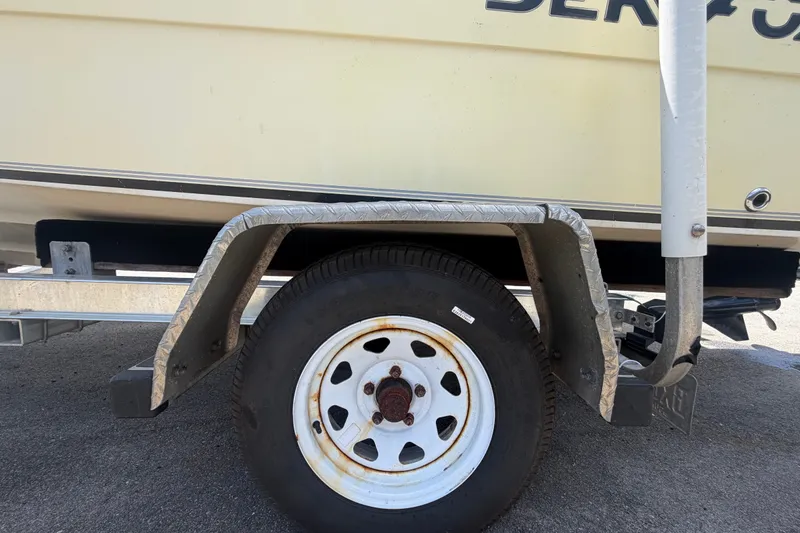 Slide: The Image of Trailer wheel of a 2005 Sea Fox 197 Center Console boat. - 55