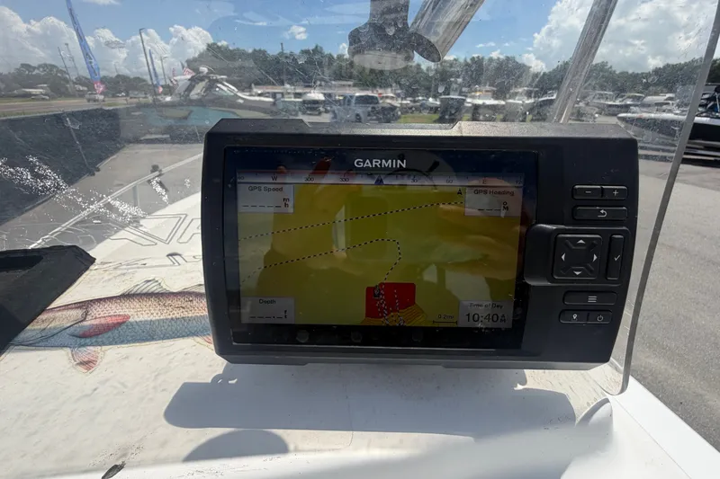Slide: The Image of Garmin GPS on 2005 Sea Fox 197 Center Console, displaying navigation data. - 17