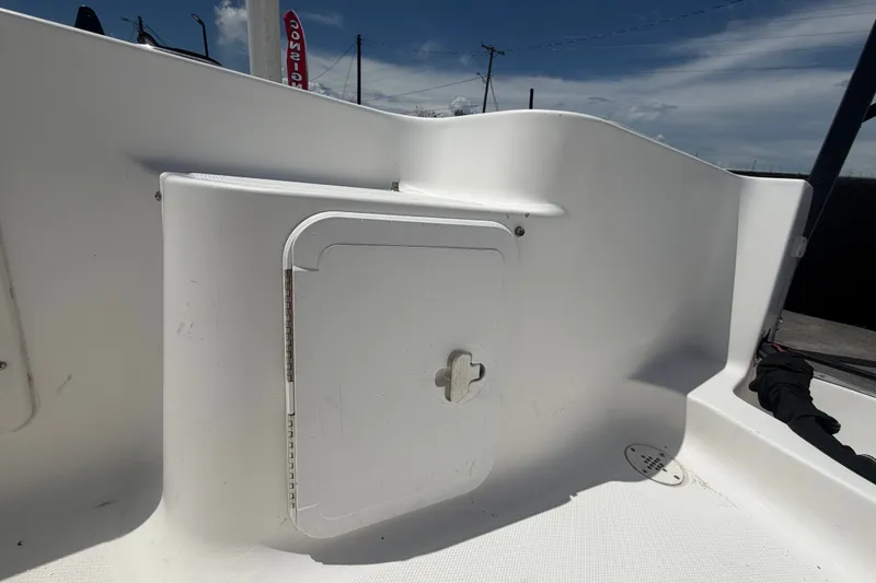 Slide: The Image of 2005 Sea Fox 197 Center Console boat interior with storage compartment. - 42