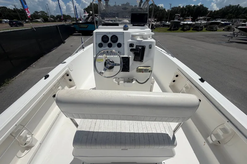 Slide: The Image of 2005 Sea Fox 197 Center Console boat interior with steering wheel and control panel. - 13