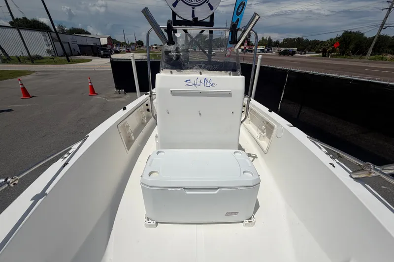 Slide: The Image of 2005 Sea Fox 197 Center Console boat interior with cooler and console view. - 32