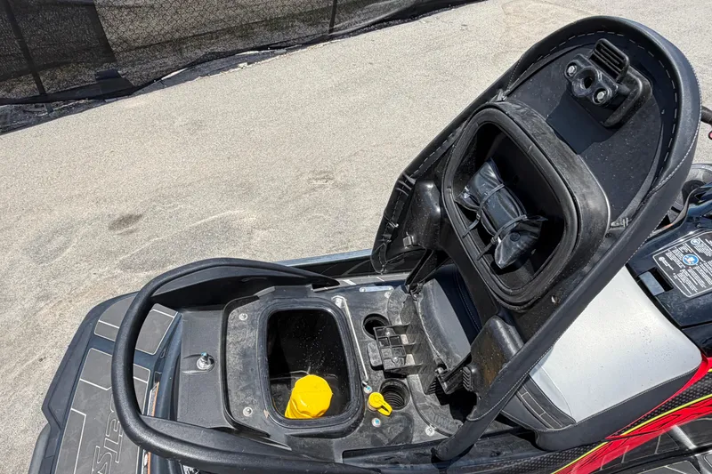 Slide: The Image of 2024 Kawasaki Jetski STX 160LX storage compartments open, showcasing interior features. - 24