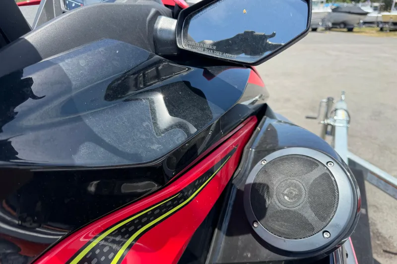 Slide: The Image of Close-up of 2024 Kawasaki Jetski STX 160LX with speaker and mirror details. - 22