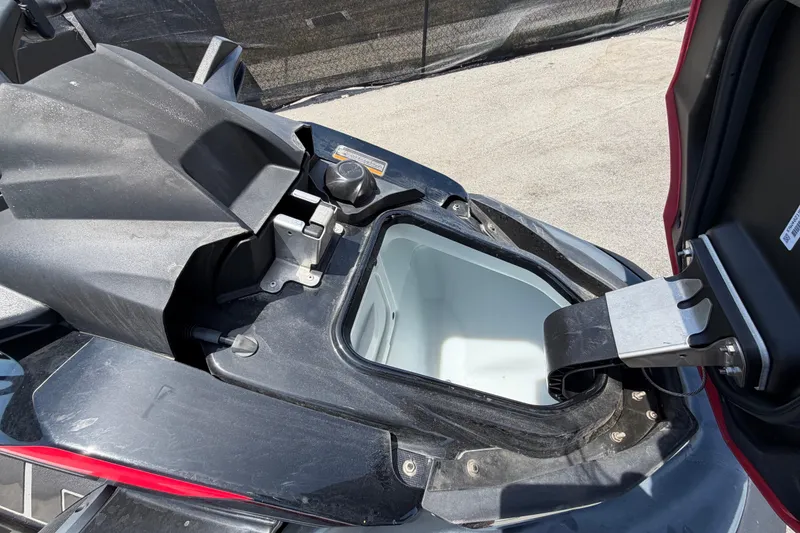 Slide: The Image of Open storage compartment of 2024 Kawasaki Jetski STX 160LX, showcasing interior space. - 26