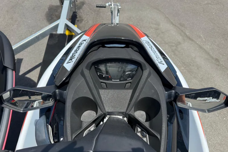 Slide: The Image of Top view of a 2024 Kawasaki Jetski STX 160LX dashboard and controls. - 40