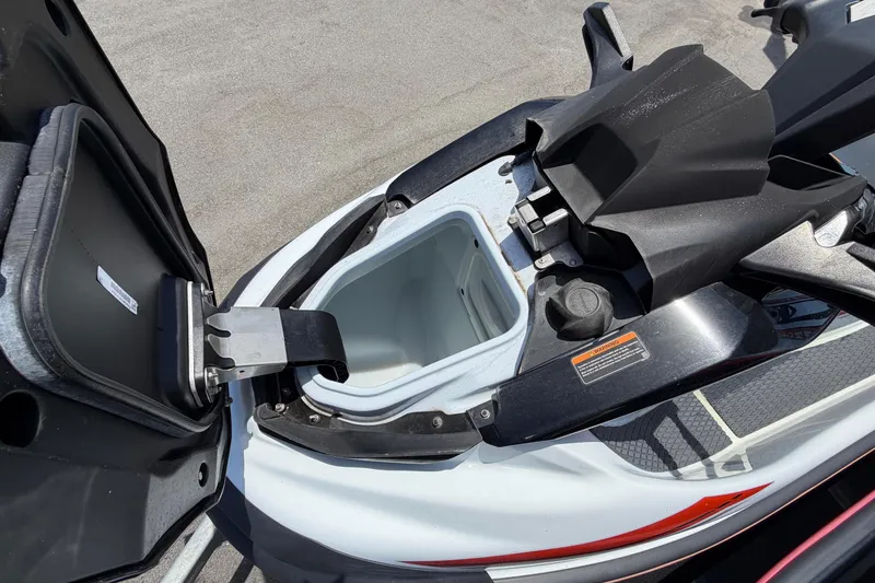 Slide: The Image of 2024 Kawasaki Jetski STX 160LX with open storage compartment. - 42