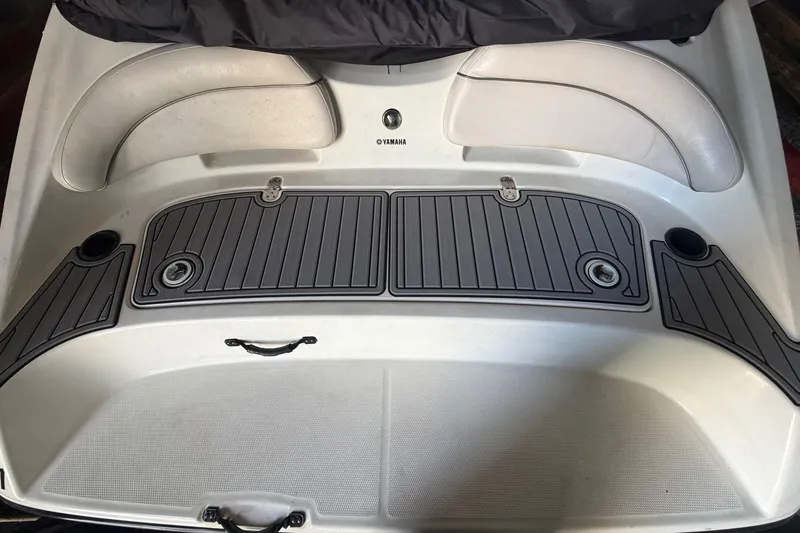 Slide: The Image of 2012 Yamaha Boats SX190 swim platform with cushioned seating and storage compartments. - 3