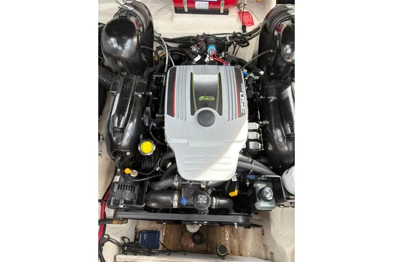 Slide: The Image of Engine of 2013 Sea Ray 240 Sundancer boat, featuring MerCruiser 350 MAG. - 20