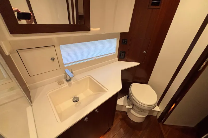 Slide: The Image of Luxurious bathroom in 2024 Pursuit OS 445 Offshore yacht with modern fixtures. - 106
