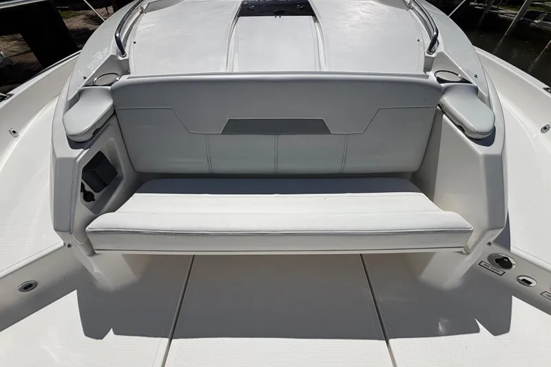 Slide: The Image of 2024 Pursuit OS 445 Offshore boat seating area with sleek, modern design. - 26