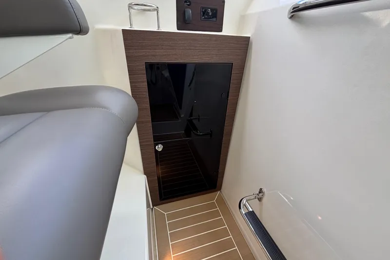 Slide: The Image of 2024 Pursuit OS 445 Offshore cabin interior with sleek design and modern finishes. - 95