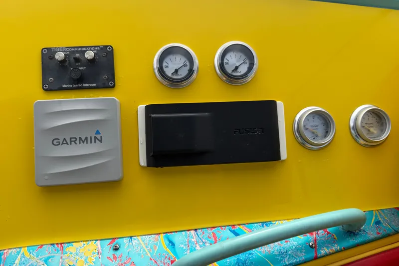 Slide: The Image of Yellow dashboard of 2011 Apache 28 Splash with Garmin and gauges. - 29