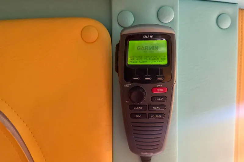 Slide: The Image of Garmin GHS 10 marine radio on Apache 28 Splash, 2011 model. - 66