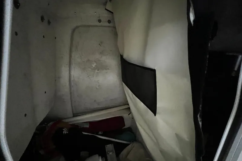 Slide: The Image of Interior storage compartment of 2024 Sea Fox 228 Commander boat, showing equipment and gear. - 65