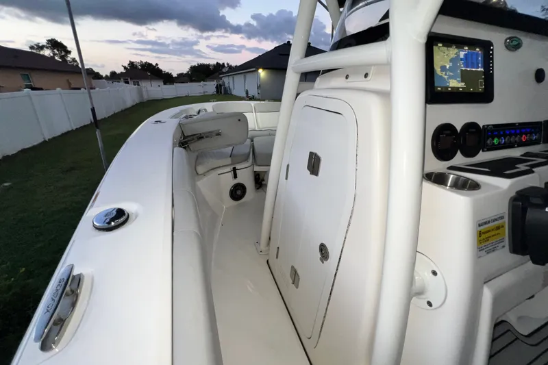 Slide: The Image of 2024 Sea Fox 228 Commander boat interior with navigation system and seating. - 27