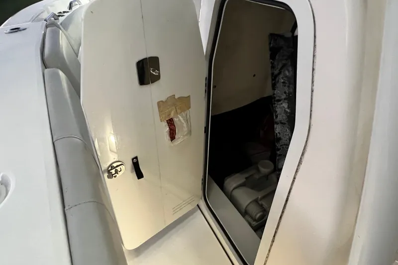 Slide: The Image of Open storage compartment on 2024 Sea Fox 228 Commander boat. - 64