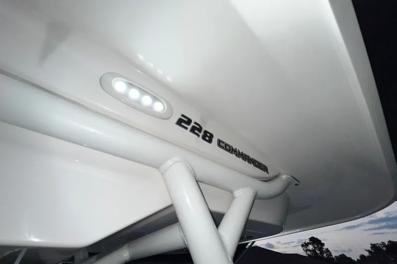Slide: The Image of 2024 Sea Fox 228 Commander boat detail with LED lights and model name. - 29