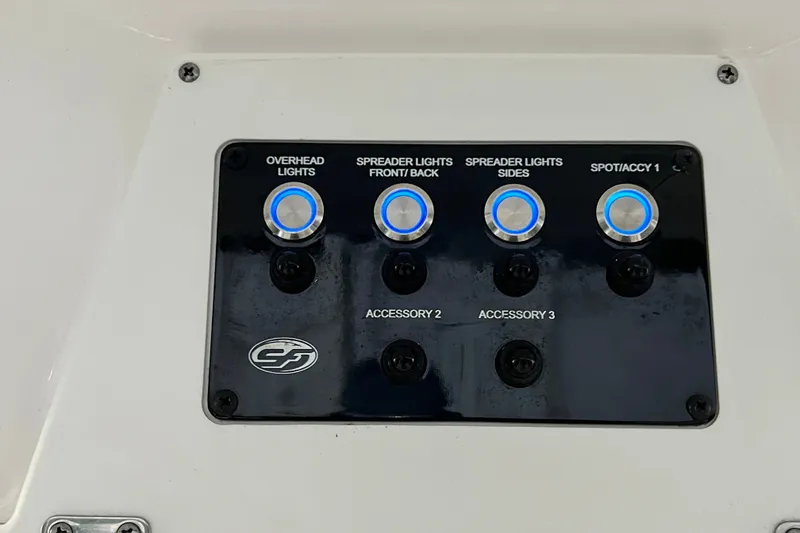 Slide: The Image of Control panel of 2024 Sea Fox 228 Commander boat with labeled light switches. - 45