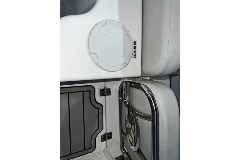 Slide: The Image of 2024 Sea Fox 228 Commander boat interior with fresh water access and storage compartment. - 69