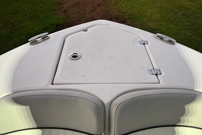 Slide: The Image of Bow view of 2024 Sea Fox 228 Commander boat, featuring storage hatch and cleats. - 63