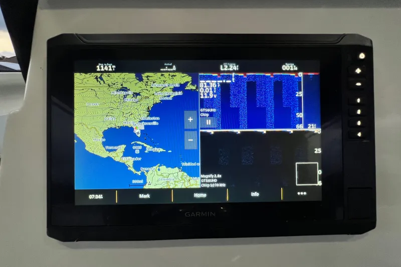 Slide: The Image of Garmin marine display on 2024 Sea Fox 228 Commander showing navigation and sonar data. - 40