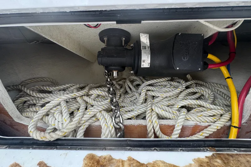 Slide: The Image of Anchor chain and ropes in a 2011 Donzi 29 ZF Open boat compartment. - 52