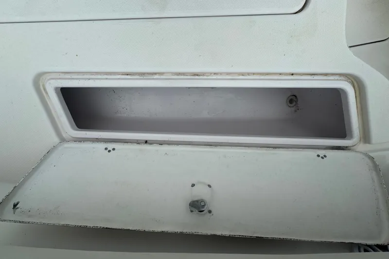 Slide: The Image of Open storage compartment on a 2011 Donzi 29 ZF Open boat. - 47