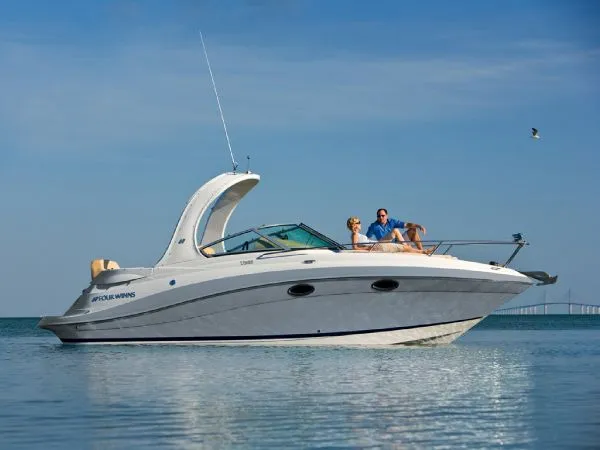 Slide: The Image of Manufacturer Provided Image: 2011 Four Winns V285 boat cruising on calm waters. - 12