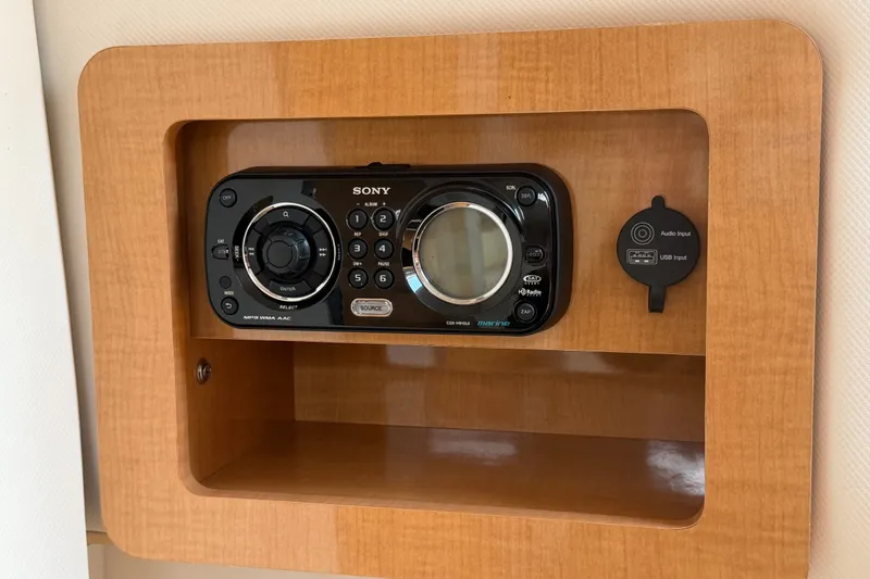 Slide: The Image of Sony marine audio system in 2011 Four Winns V285 boat, featuring USB and audio inputs. - 89