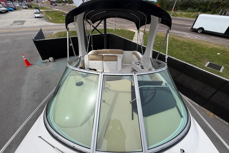 Slide: The Image of 2011 Four Winns V285 boat with spacious seating and sleek design, viewed from above. - 39