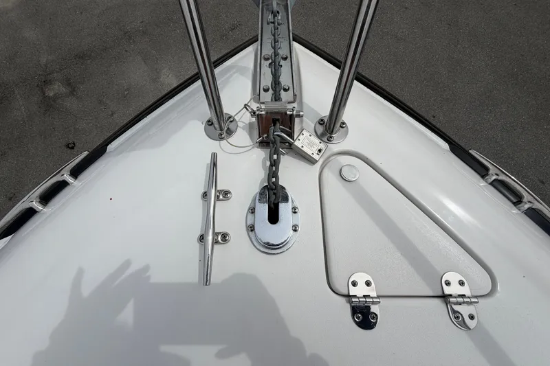 Slide: The Image of Bow of 2011 Four Winns V285 boat with anchor and cleat details. - 34