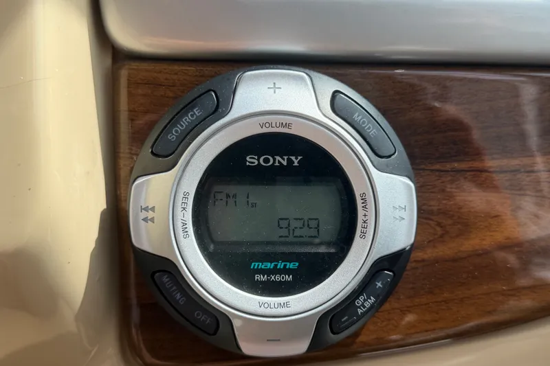 Slide: The Image of Sony marine radio display on 2011 Four Winns V285 boat dashboard. - 28