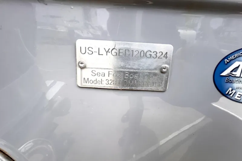 Slide: The Image of 2024 Sea Fox 328 Commander identification plate with serial number and certification sticker. - 91