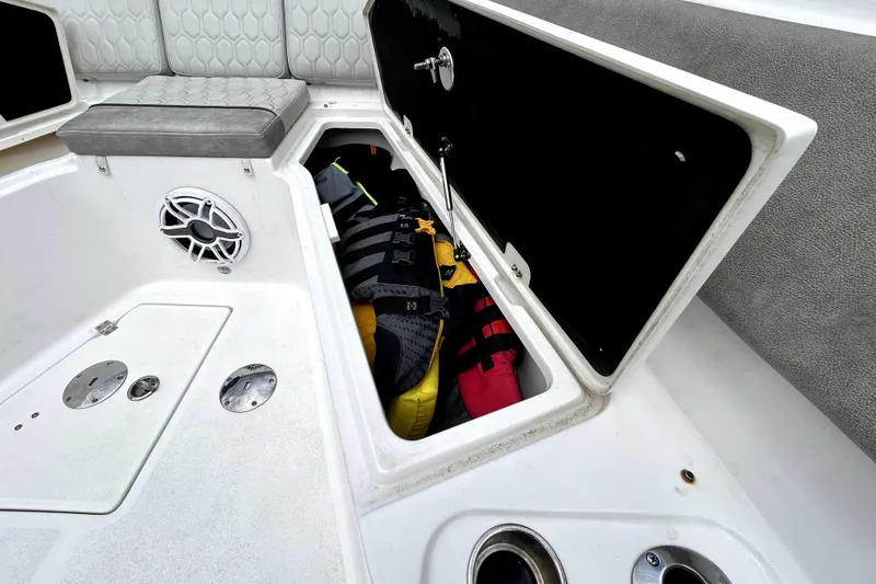 Slide: The Image of Storage compartment on 2024 Sea Fox 328 Commander boat with life jackets inside. - 55
