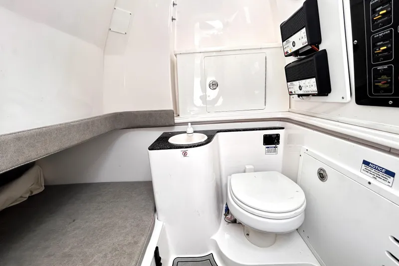 Slide: The Image of 2024 Sea Fox 328 Commander boat interior with toilet and sink. - 45