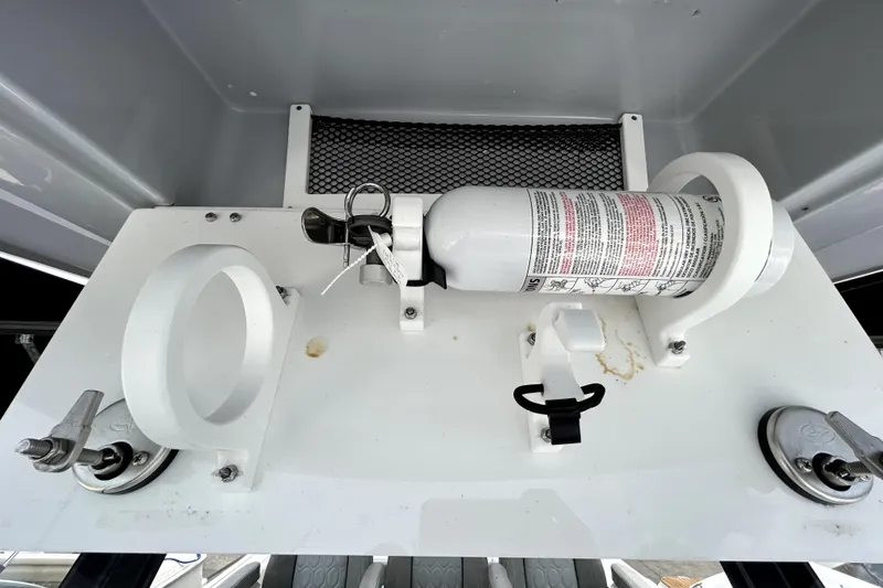 Slide: The Image of Fire extinguisher mounted on 2024 Sea Fox 328 Commander boat. - 65