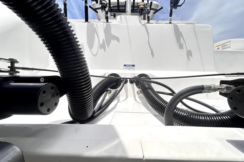 Slide: The Image of 2024 Sea Fox 328 Commander boat interior with visible cables and equipment. - 82