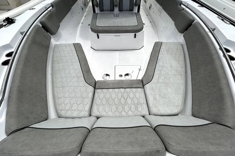 Slide: The Image of Luxurious seating area on 2024 Sea Fox 328 Commander boat, featuring elegant gray upholstery. - 60
