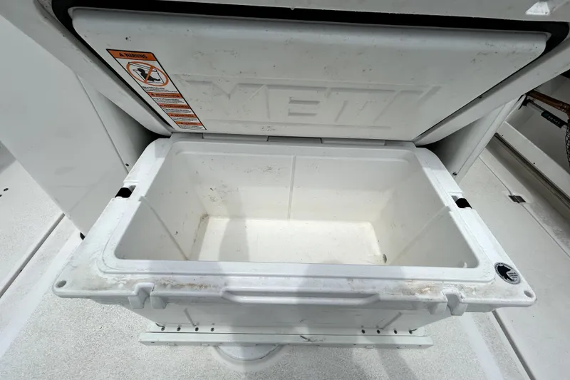 Slide: The Image of Open YETI cooler on 2024 Sea Fox 328 Commander boat deck. - 24