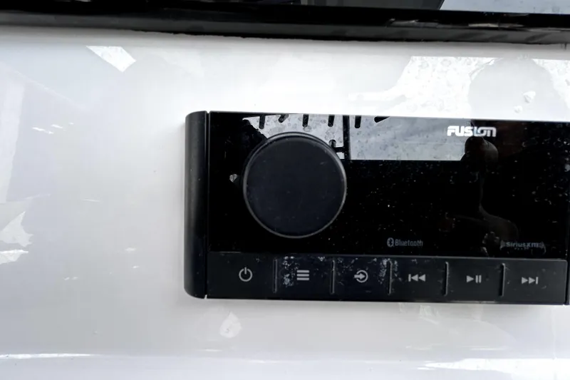 Slide: The Image of Control panel on 2024 Sea Fox 328 Commander boat, featuring Fusion audio system. - 34