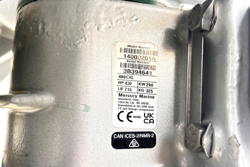 Slide: The Image of Label on Mercury Marine engine, showing model and serial numbers, horsepower, and compliance details. - 89