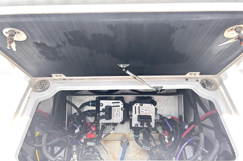 Slide: The Image of 2024 Sea Fox 328 Commander electrical compartment with wiring and components visible. - 69