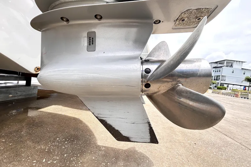 Slide: The Image of Close-up of 2024 Sea Fox 328 Commander boat propeller on a concrete surface. - 13
