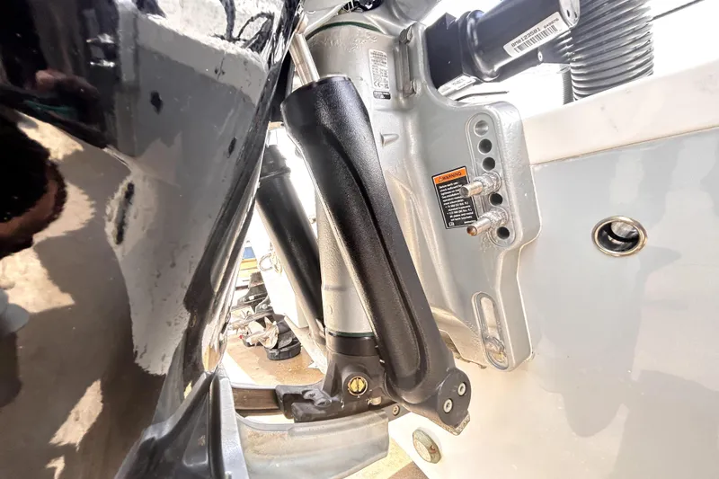 Slide: The Image of Close-up of 2024 Sea Fox 328 Commander boat engine mount and hydraulic system. - 83