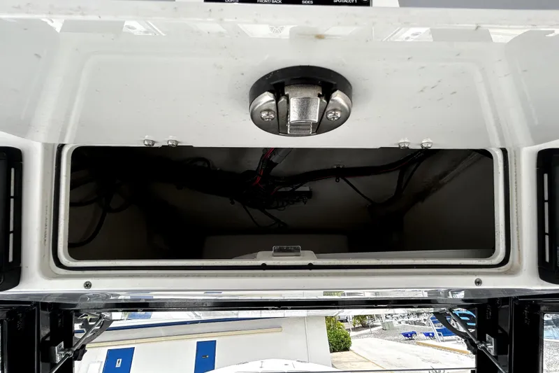 Slide: The Image of Storage compartment of 2024 Sea Fox 328 Commander boat, showcasing interior wiring. - 39