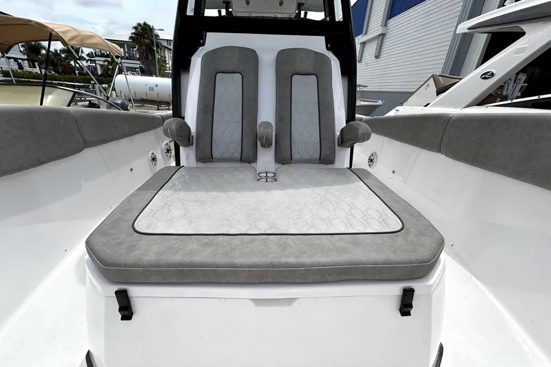 Slide: The Image of 2024 Sea Fox 328 Commander boat interior with cushioned seating and modern design. - 61