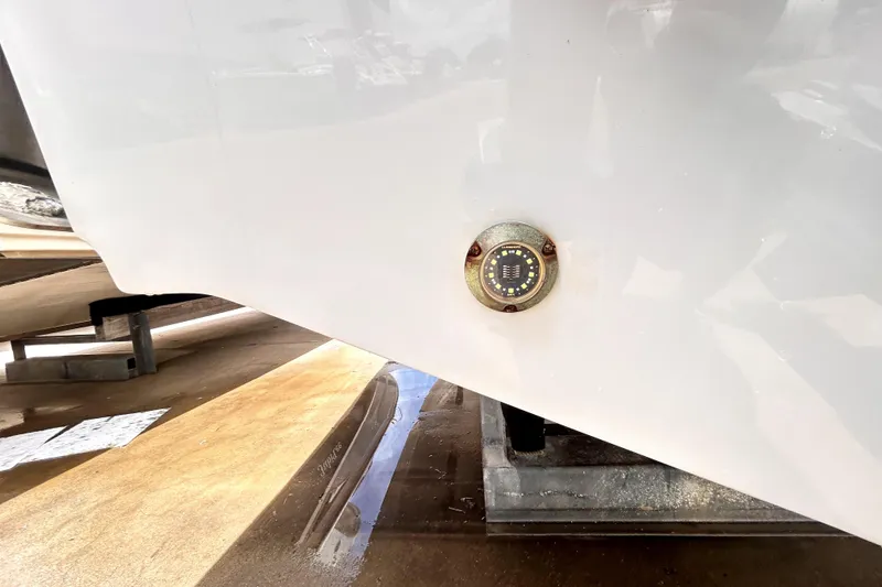Slide: The Image of 2024 Sea Fox 328 Commander hull detail with underwater light. - 85