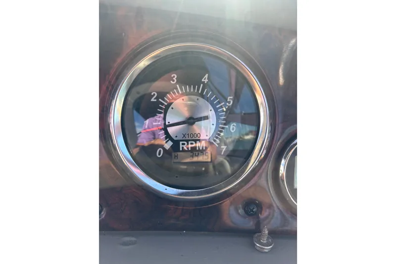 Slide: The Image of Close-up of 2012 Crownline 260 CR RPM gauge displaying 3,475 RPM. - 21