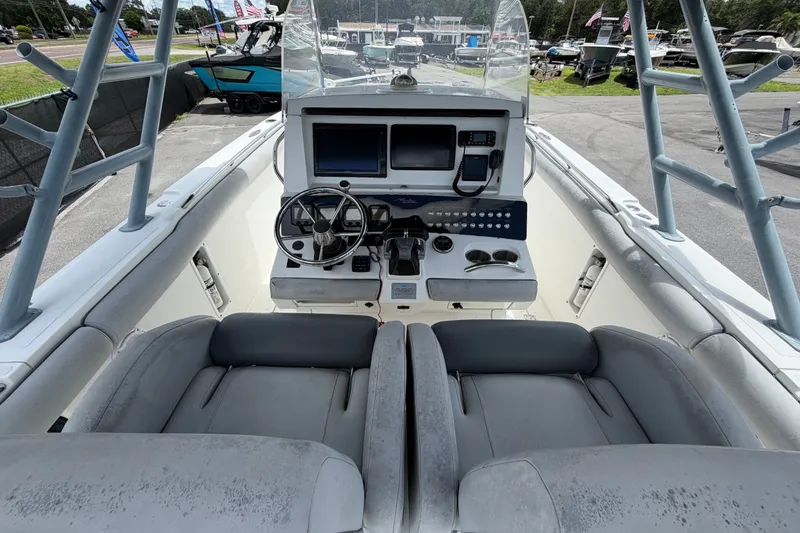 Slide: The Image of Cockpit view of 2011 Jefferson Marlago FS35 boat with steering wheel and controls. - 29